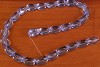 Glaskraal plat rond Blauw met geluksoog 18x10 mm